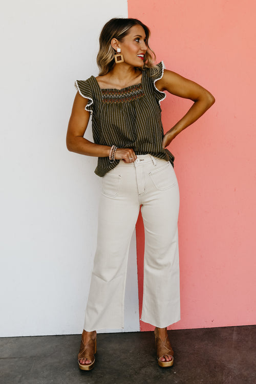 The Riven Striped Embroidered Ruffle Top