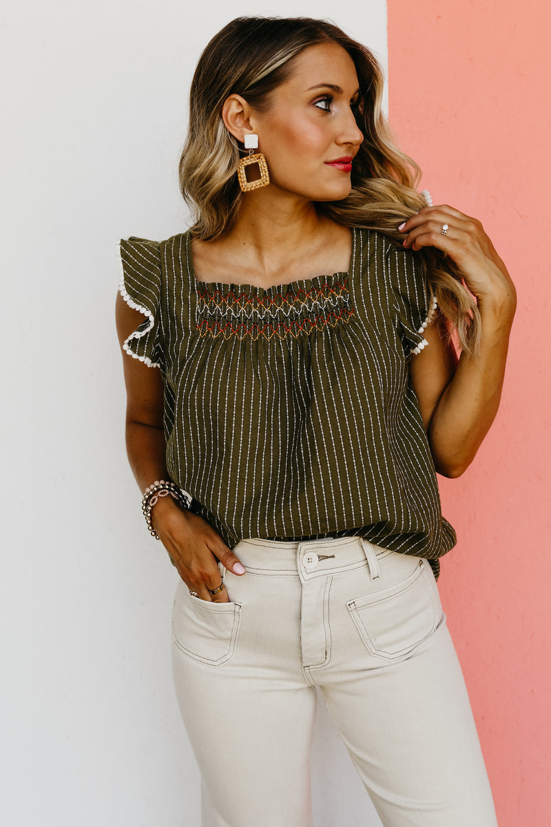 The Riven Striped Embroidered Ruffle Top