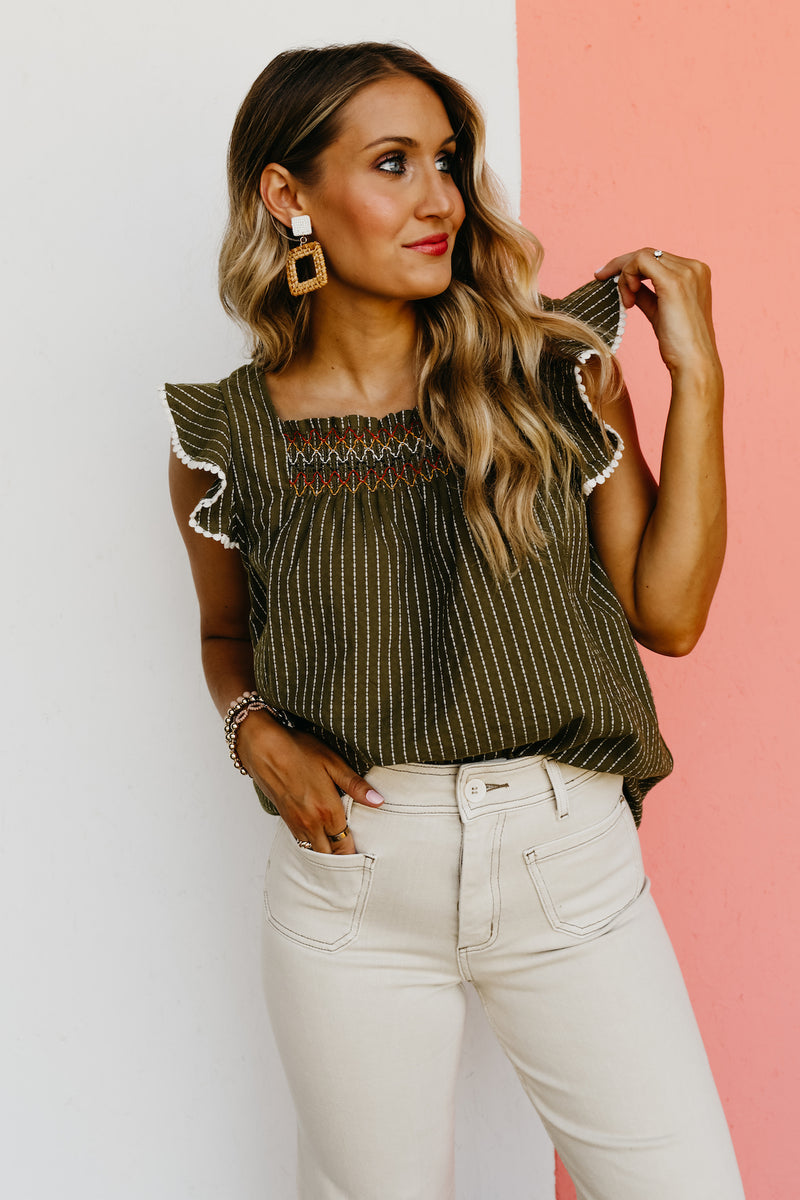 The Riven Striped Embroidered Ruffle Top