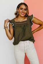 The Riven Striped Embroidered Ruffle Top
