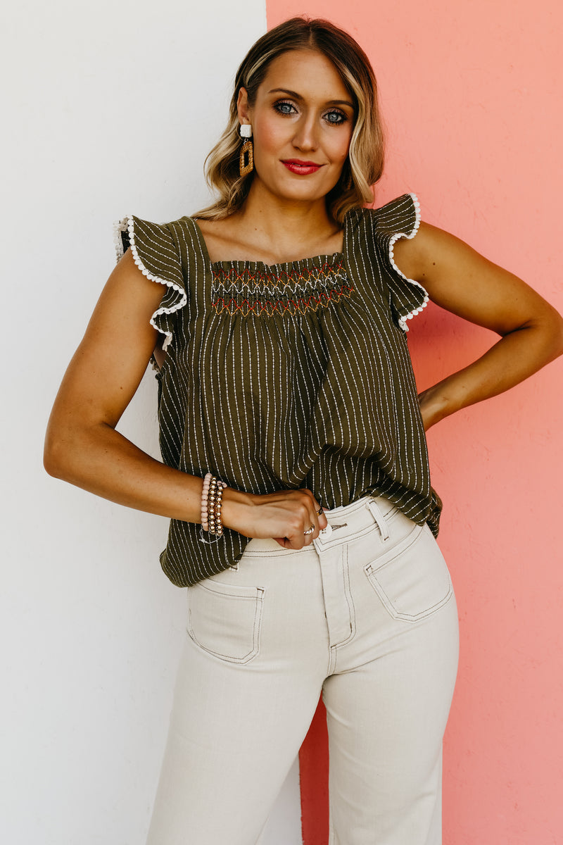 The Riven Striped Embroidered Ruffle Top