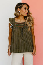 The Riven Striped Embroidered Ruffle Top