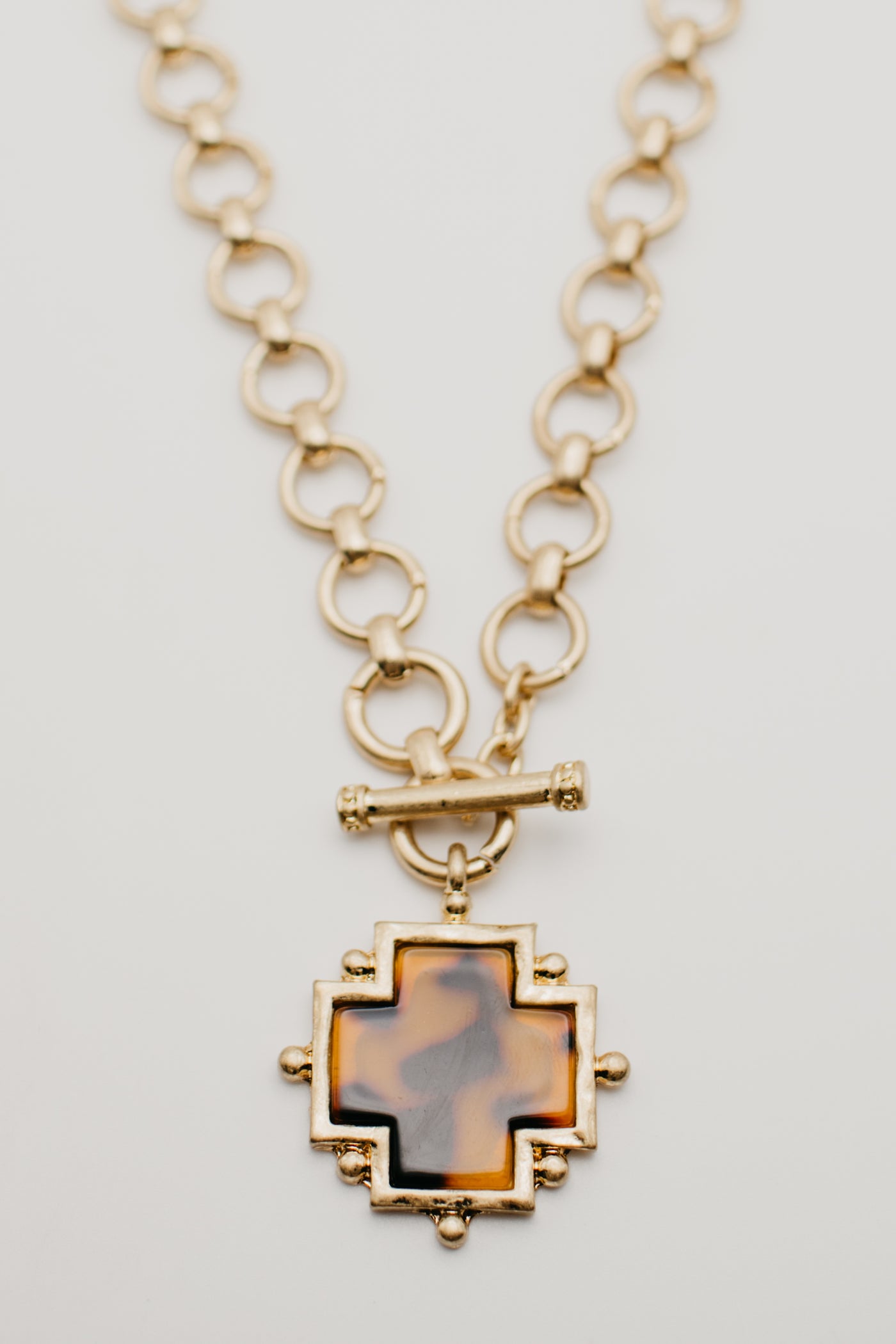 The Tessa Cross Toggle Necklace