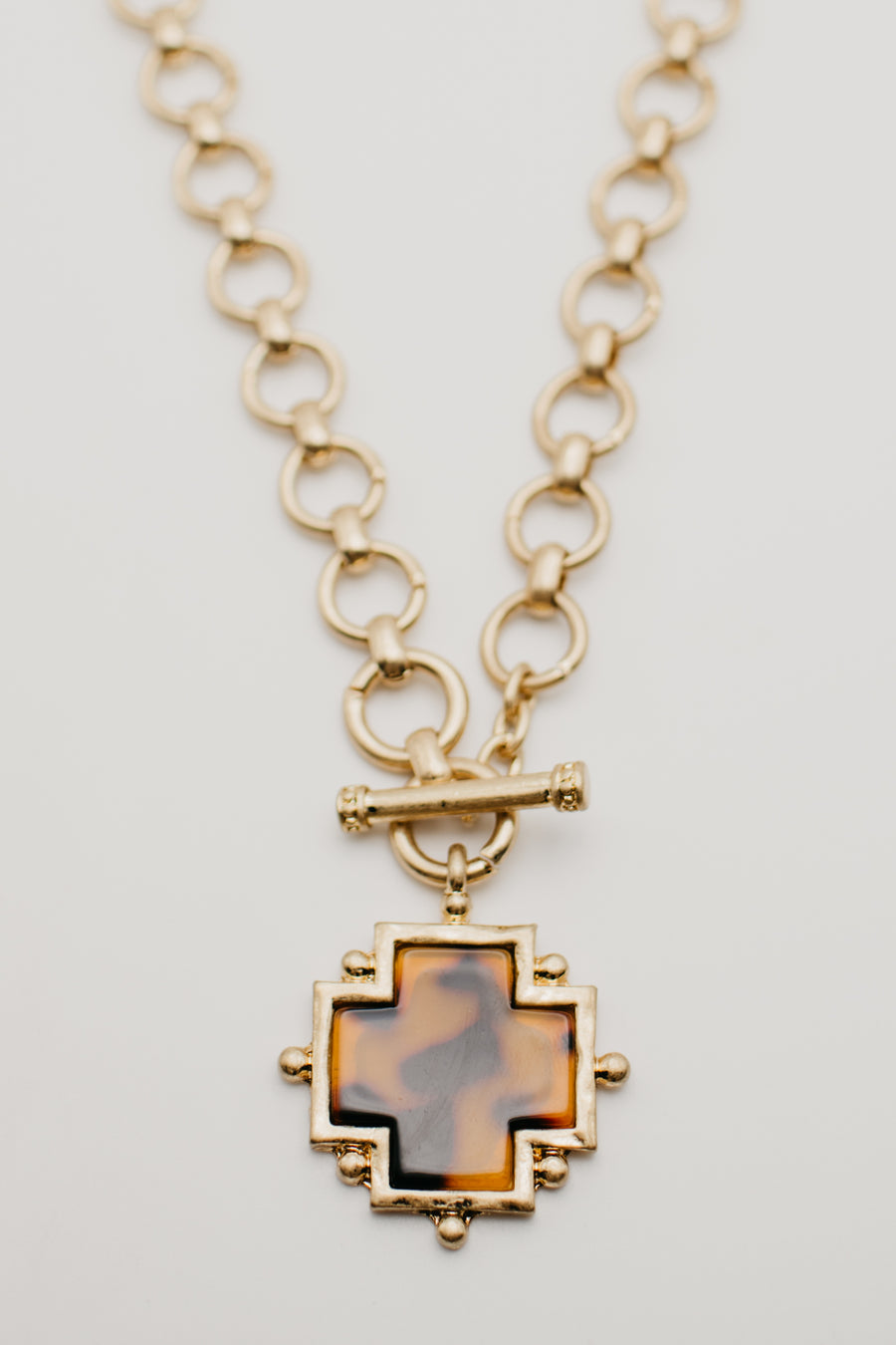 The Tessa Cross Toggle Necklace