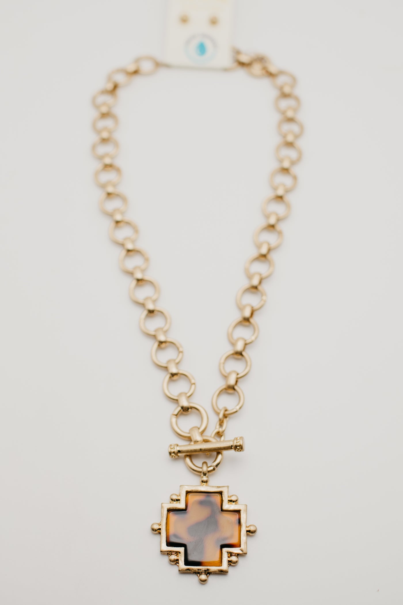 The Tessa Cross Toggle Necklace