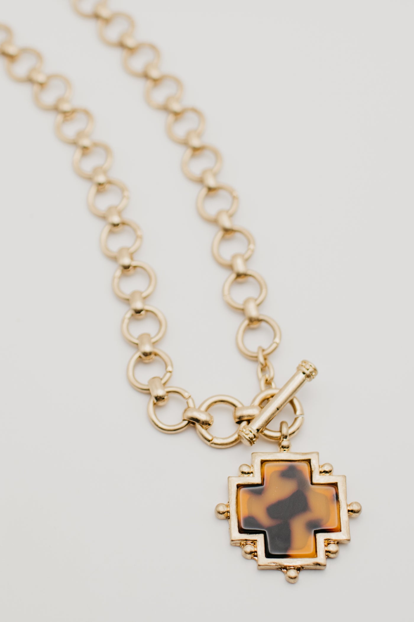 The Tessa Cross Toggle Necklace