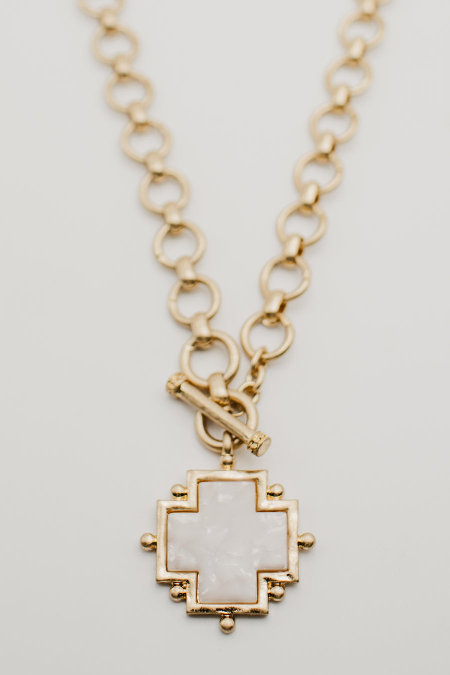 The Tessa Cross Toggle Necklace