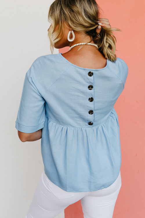 The Sarah Button Back Peplum Top