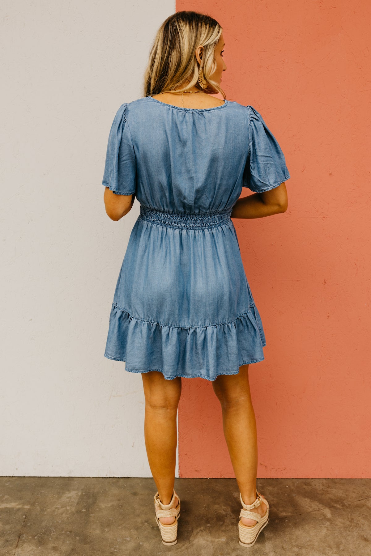 The Gianni Split Neck Flounce Chambray Mini Dress