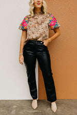 The Alaia Vegan Leather Straight Leg Pants