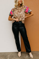 The Alaia Vegan Leather Straight Leg Pants