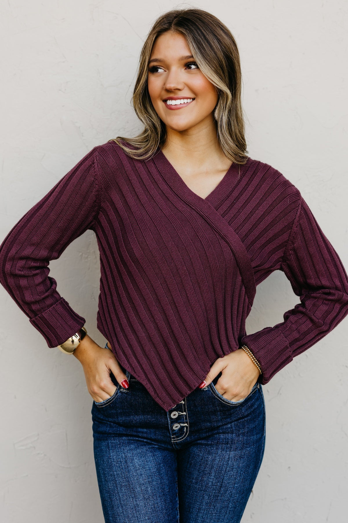The Lotus Asymmetrical Hem Line Sweater