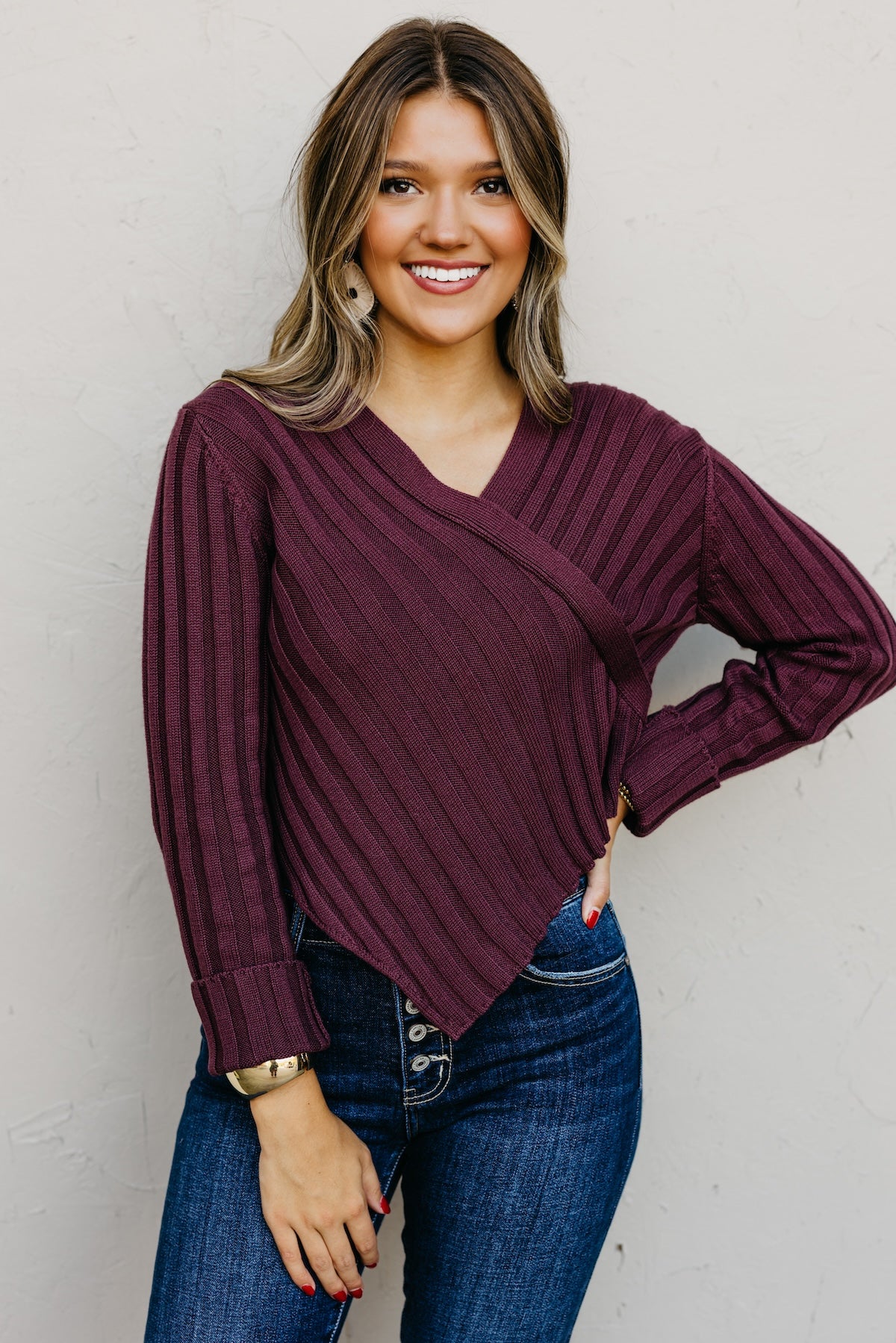 The Lotus Asymmetrical Hem Line Sweater