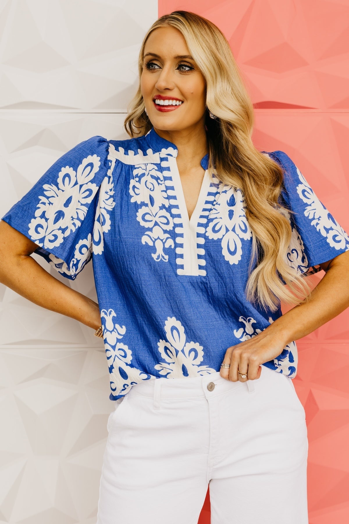 The Tessa Printed Notched V Neck Blouse