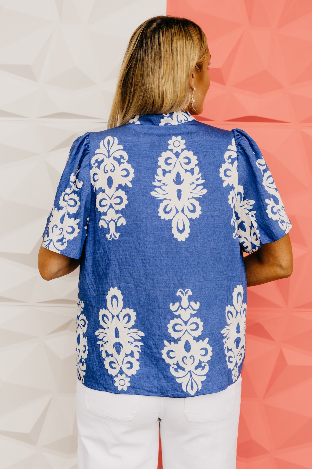 The Tessa Printed Notched V Neck Blouse