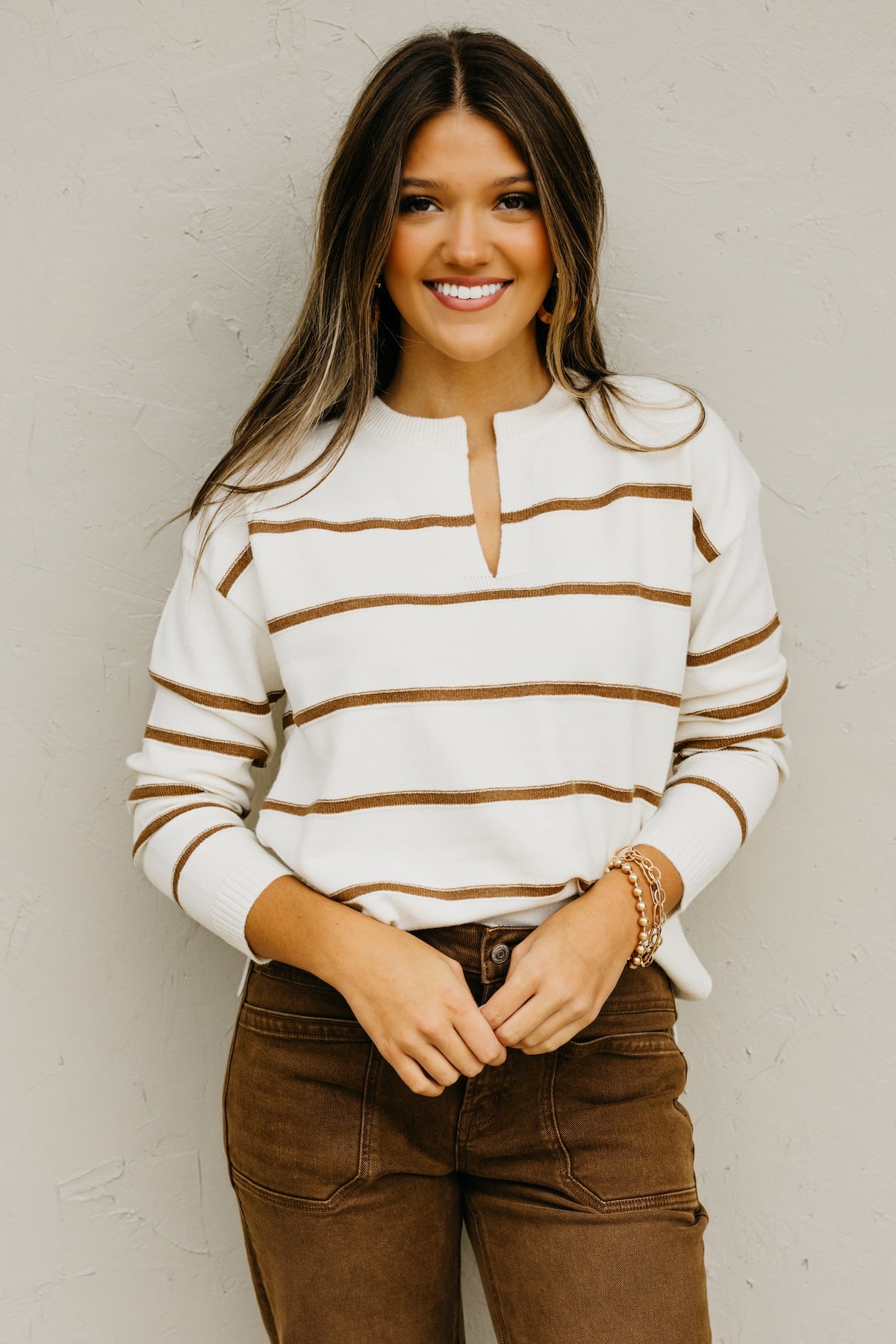 The Rita Striped Notched V Neckline Sweater