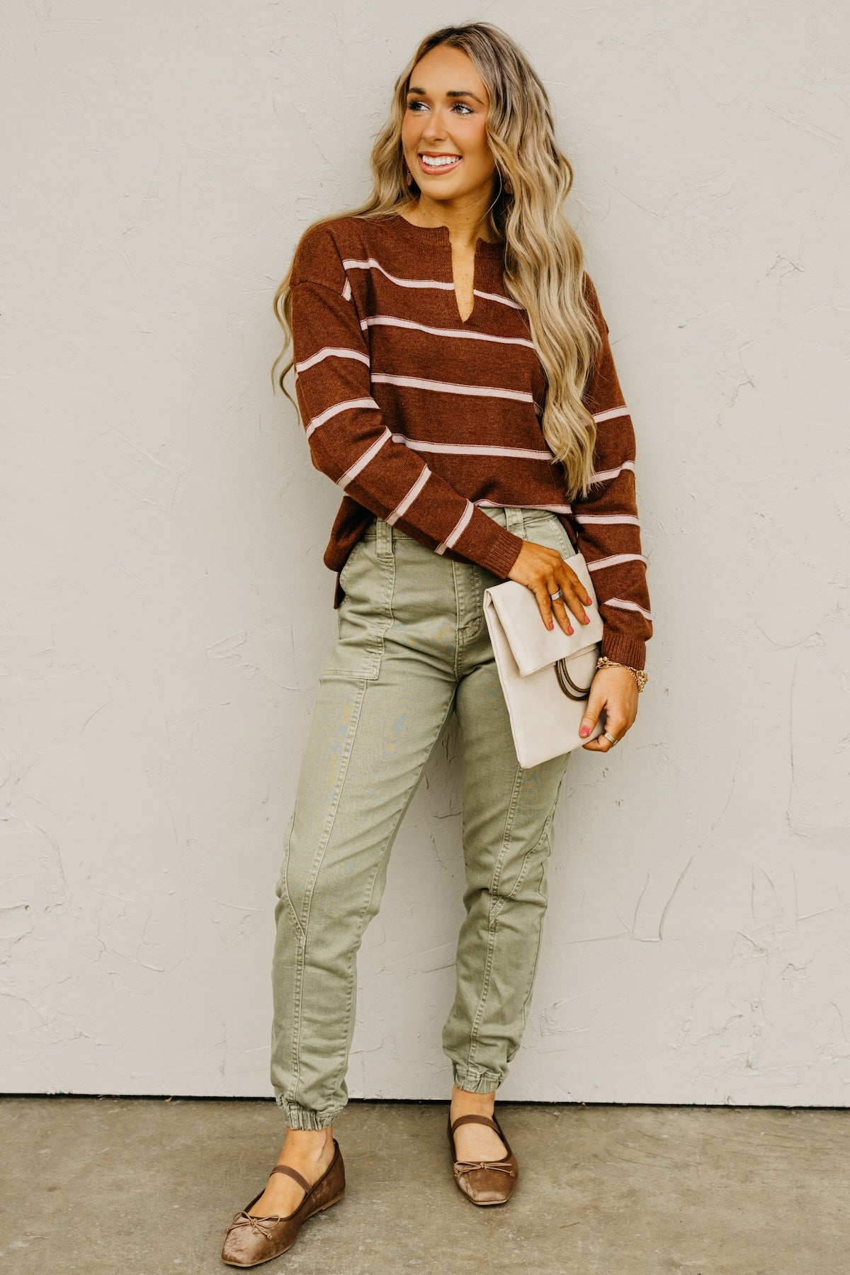 The Rita Striped Notched V Neckline Sweater