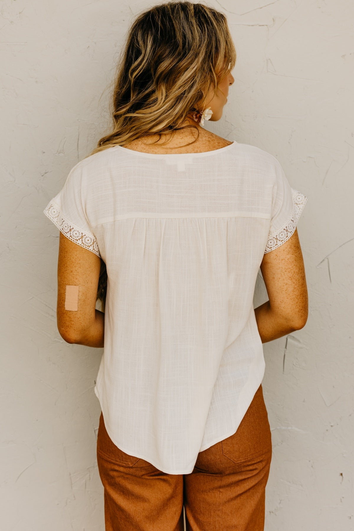 The Jaylah Lace Trim Pleat Yoke Top