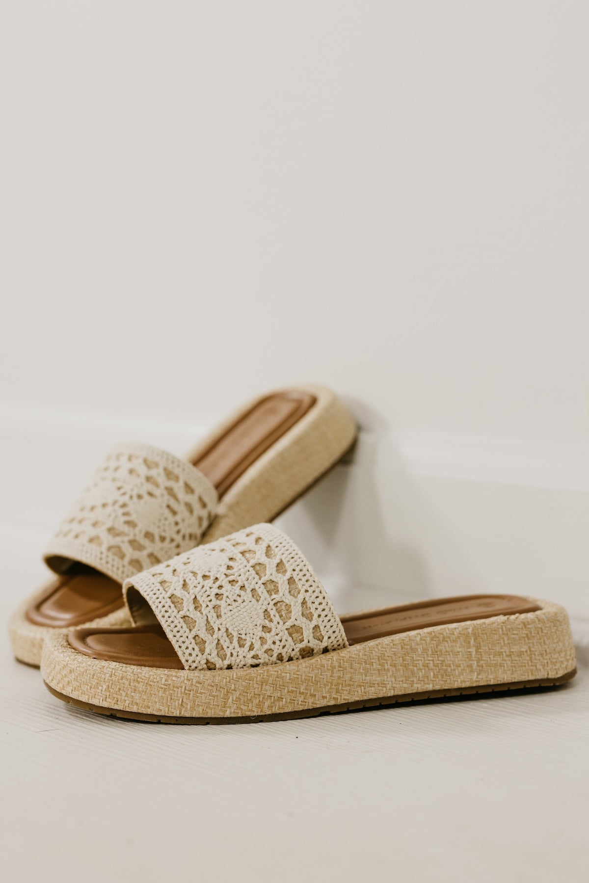 The Capria Raffia Wedged Sandal