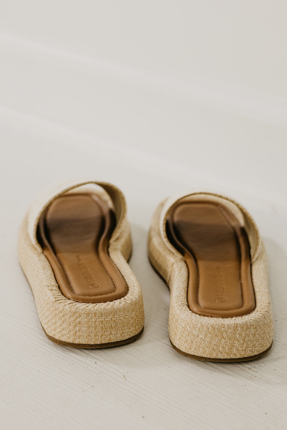 The Capria Raffia Wedged Sandal