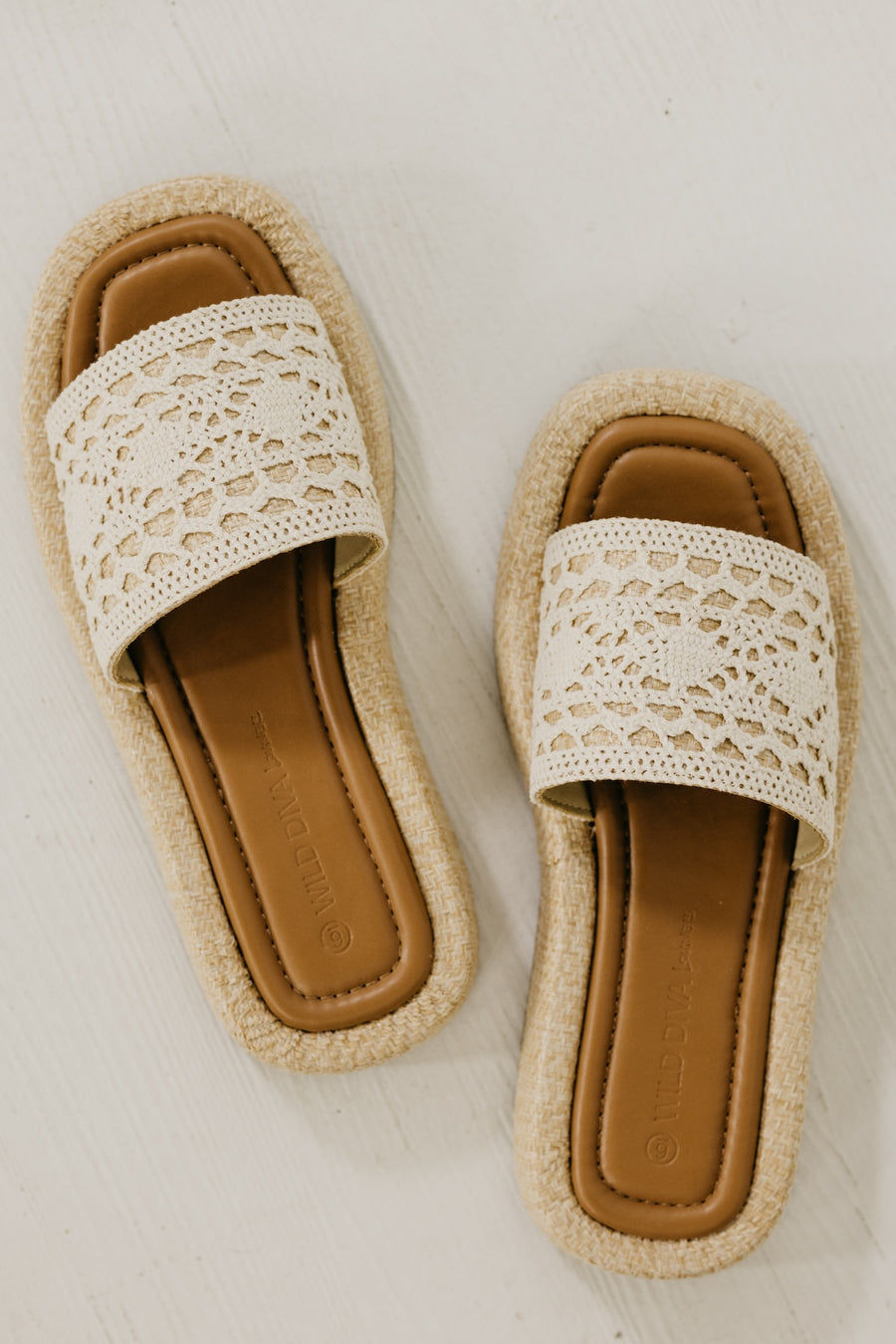 The Capria Raffia Wedged Sandal