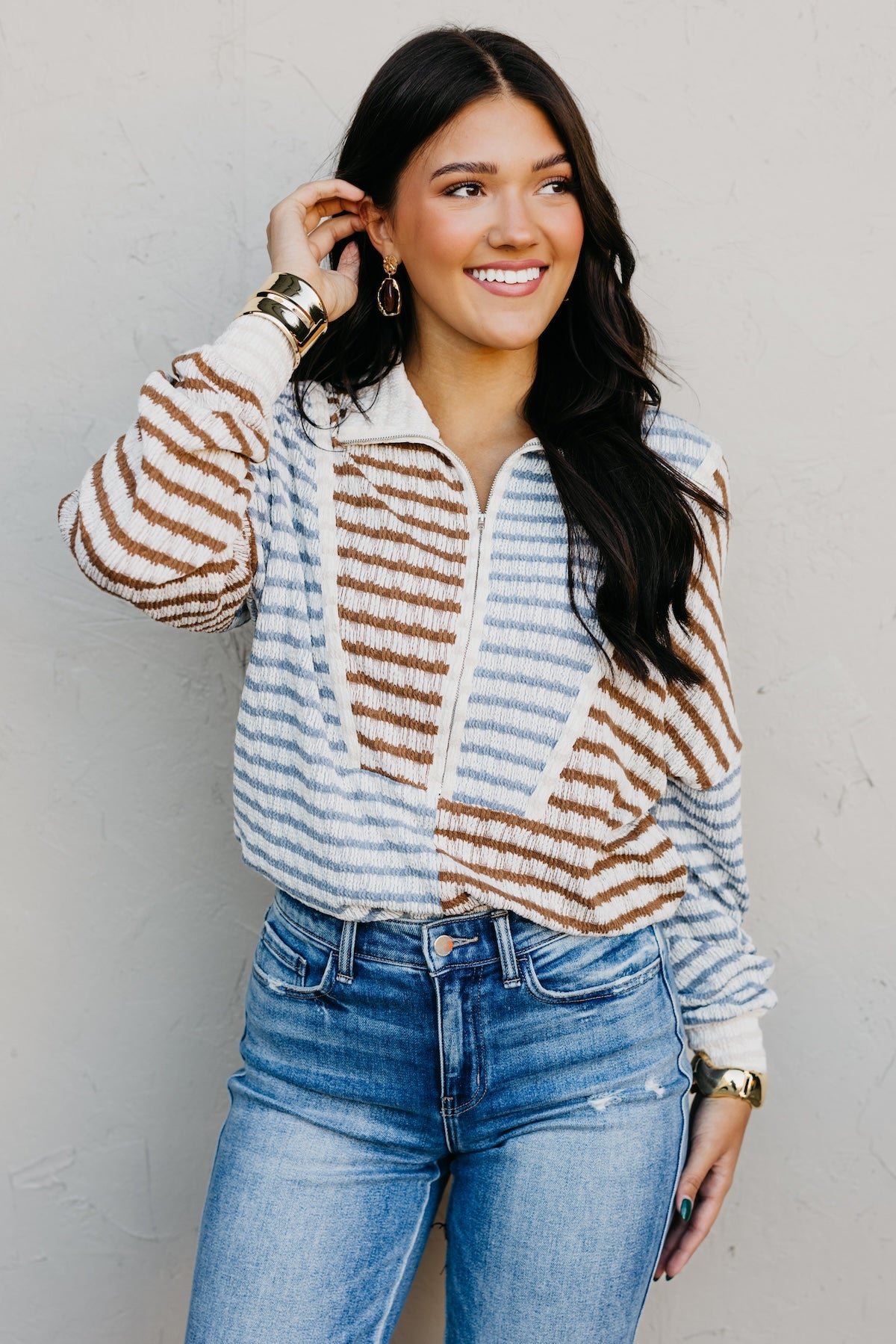 The Ryker Quarter Zip Striped Sweater