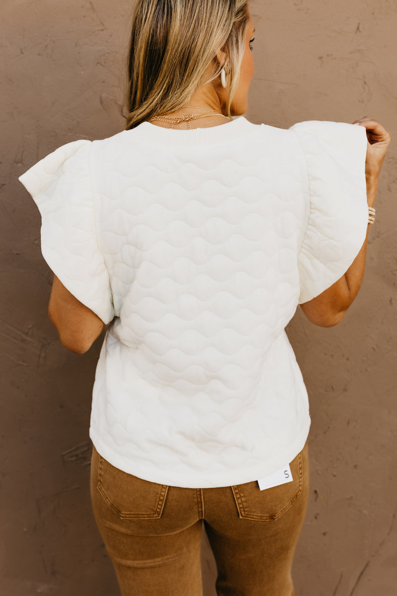The Dylan Quilted Flutter Sleeve Knit Top