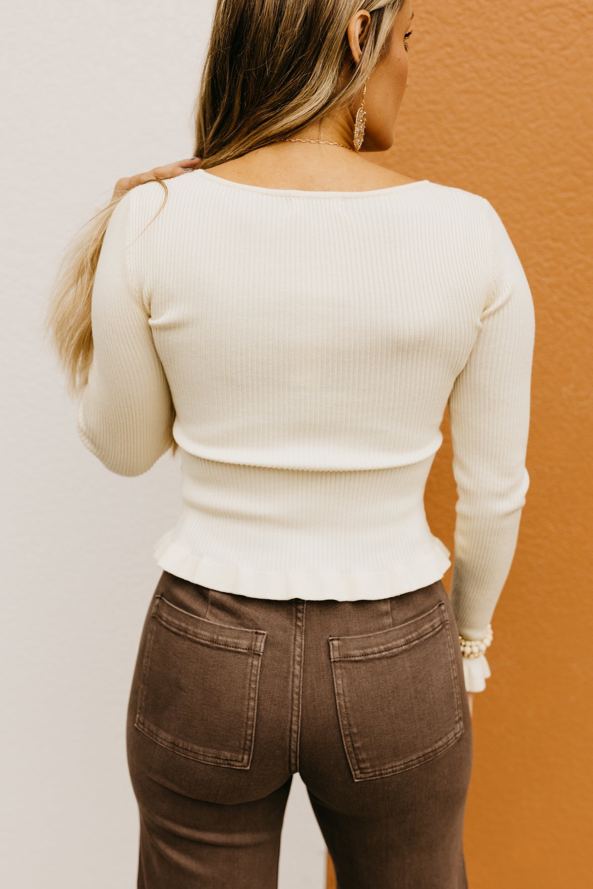 The Jairo Ruffle Hem Sweater