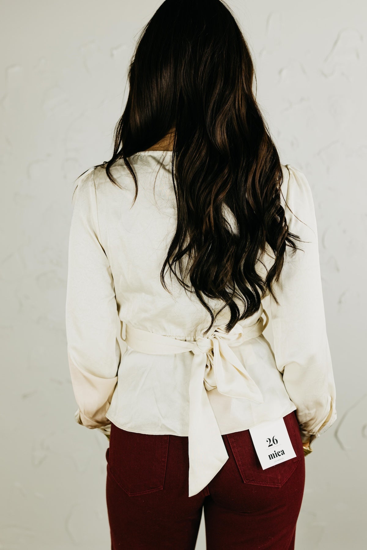 The Zoie Peplum Twist Blouse