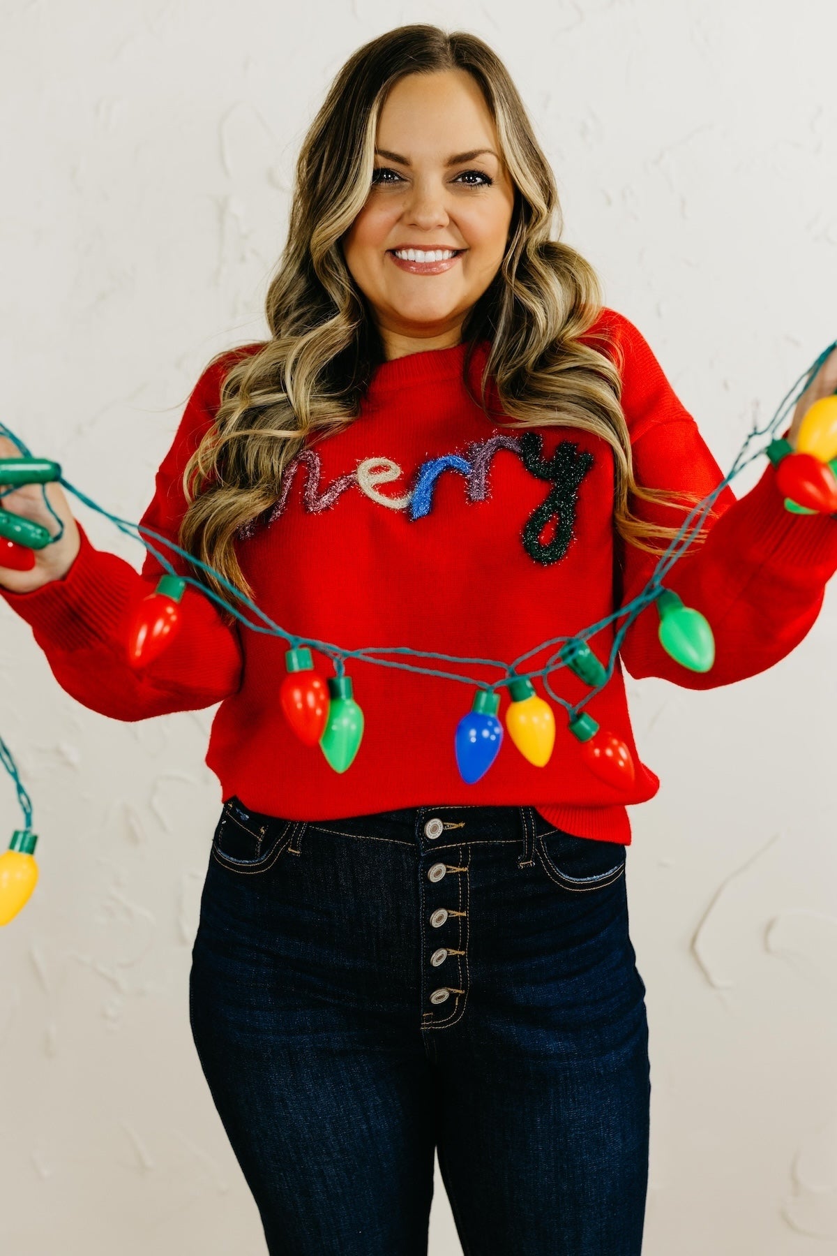 The Merry Tinsel Graphic Sweater
